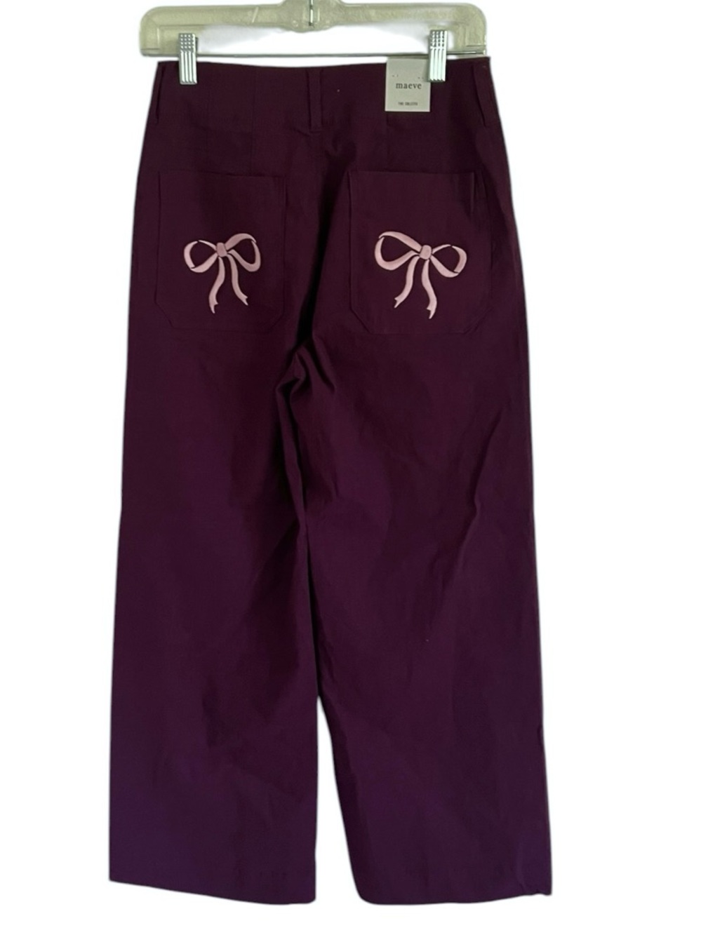Anthropologie Wide-Leg Cropped Pants in Deep Plum with Pink Bow Accents